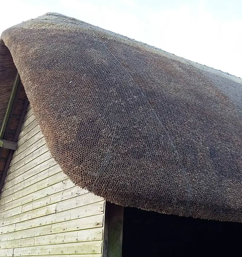 what is the wire on a thatched roof for